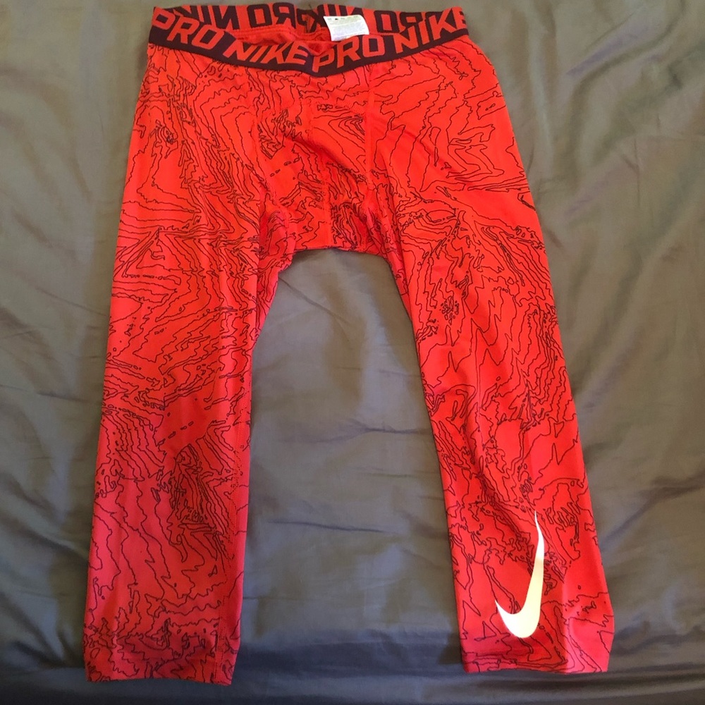 Apple red men’s Nike compression pants